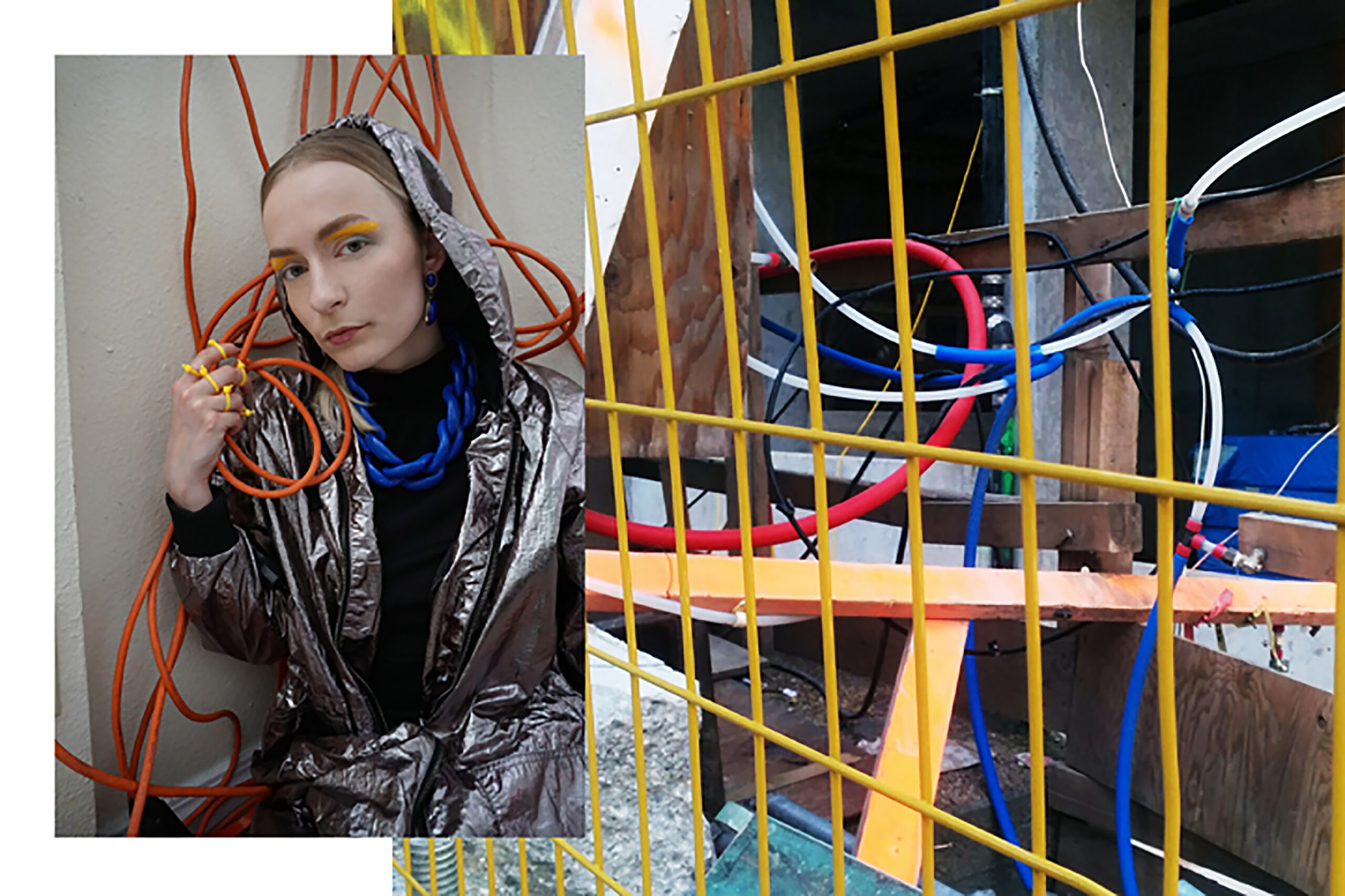 model poses with extension cords in a metallic jacket