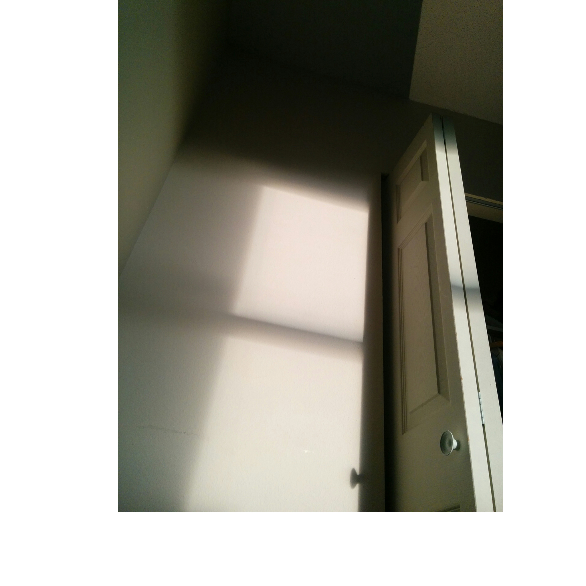 an artful reflection on a folding closet door