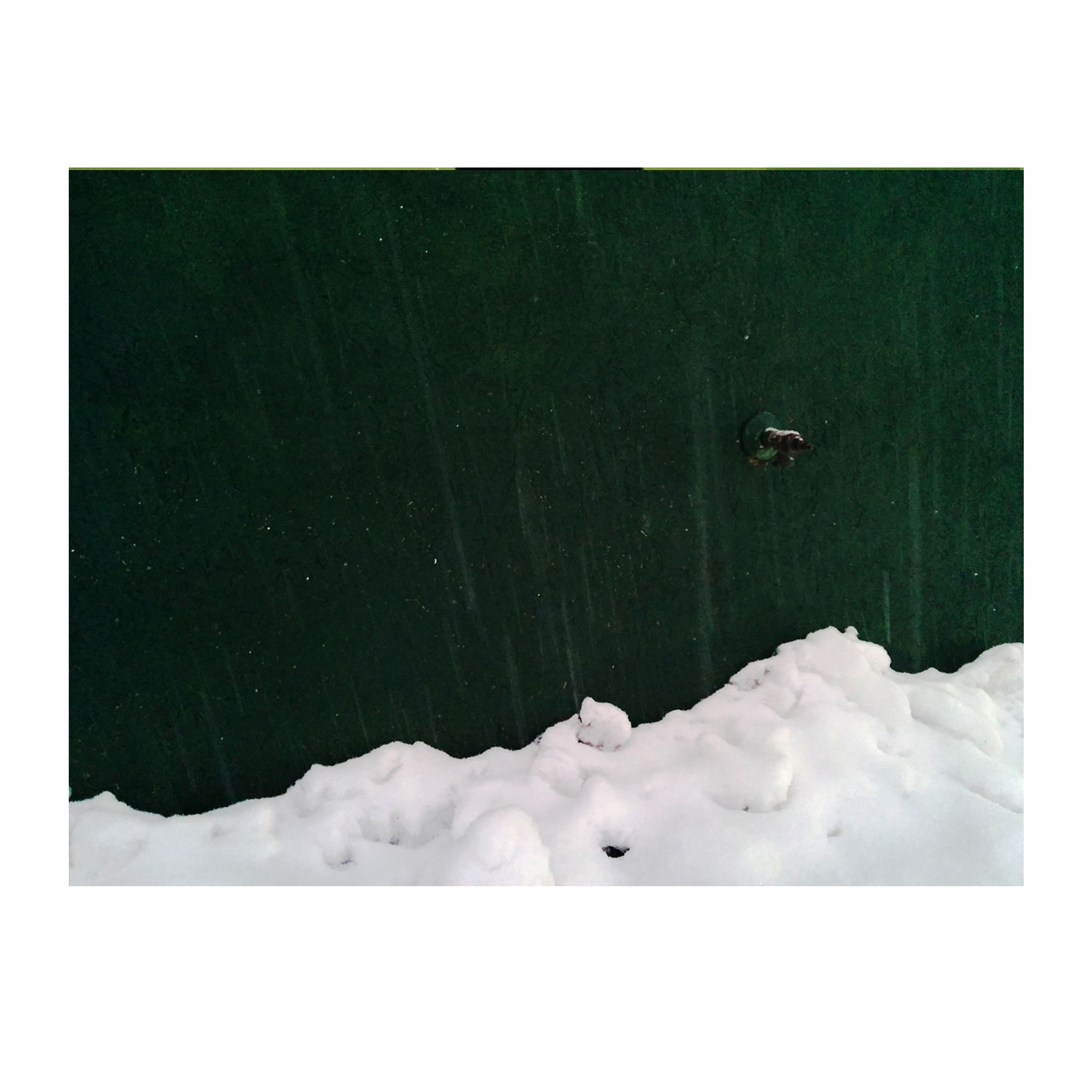 green wall and snow